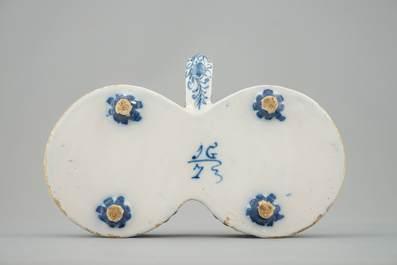 A Dutch Delft blue and white cruet set stand, 18th C.