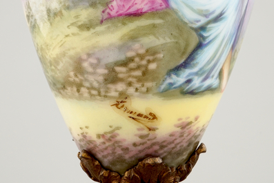 Une paire de vases en porcelaine de S&egrave;vres mont&eacute; en bronze et email champlev&eacute;, 19&egrave;me