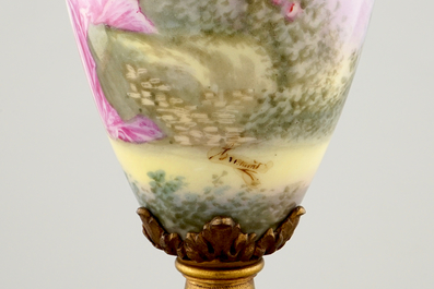 Une paire de vases en porcelaine de S&egrave;vres mont&eacute; en bronze et email champlev&eacute;, 19&egrave;me