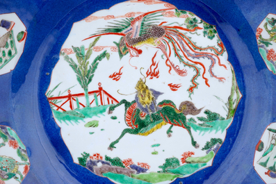 A pair of large Chinese famille verte blue ground dishes, Kangxi