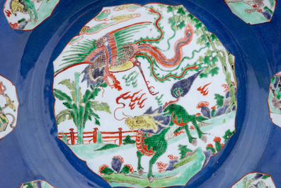 A pair of large Chinese famille verte blue ground dishes, Kangxi