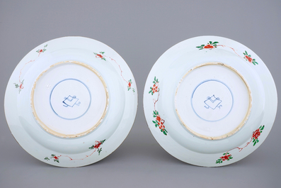 A pair of large Chinese famille verte blue ground dishes, Kangxi