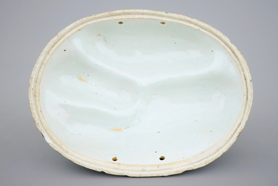An unusual blue and white Chinese porcelain walnut-shaped hanging ornament or lid, 18th C.