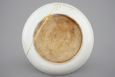 A Chinese underglaze design white monochrome dish, Kangxi