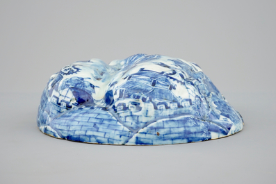 An unusual blue and white Chinese porcelain walnut-shaped hanging ornament or lid, 18th C.