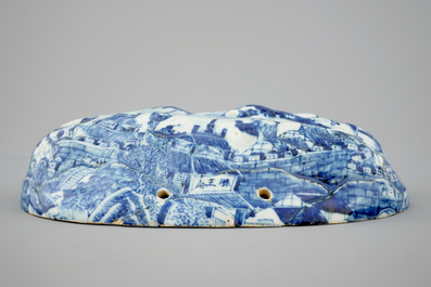 An unusual blue and white Chinese porcelain walnut-shaped hanging ornament or lid, 18th C.