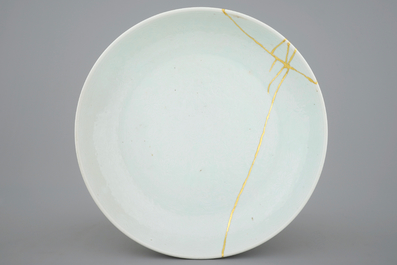 A Chinese underglaze design white monochrome dish, Kangxi