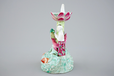 A Chinese famille rose figural candle holder, 19th C.