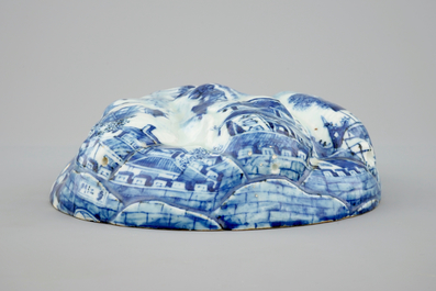 An unusual blue and white Chinese porcelain walnut-shaped hanging ornament or lid, 18th C.