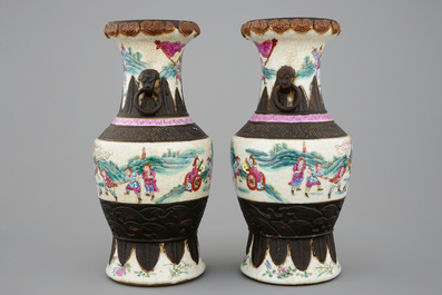 A mirrored pair of Chinese famille rose Nanking vases, 19th C.