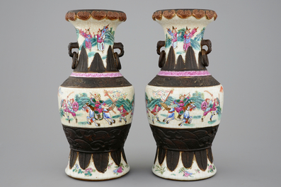 A mirrored pair of Chinese famille rose Nanking vases, 19th C.