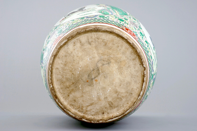 A large Chinese famille verte fish bowl with mythological animals, 19th C.