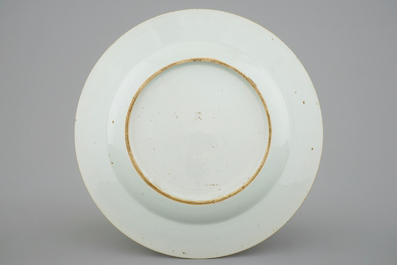 A fine Chinese famille rose plate with butterflies on the rim, Yongzheng, 1723-1735