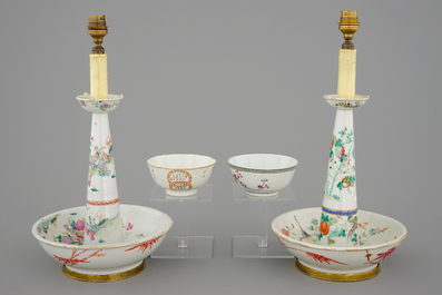 Two Chinese famille rose bowls and two candlesticks, 19th C.