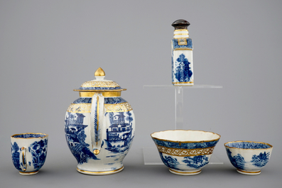 A Chinese blue, white and gilt part tea service with landscapes, Qianlong, 18th C.