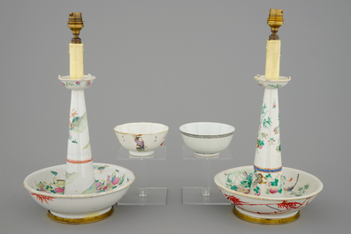 Two Chinese famille rose bowls and two candlesticks, 19th C.