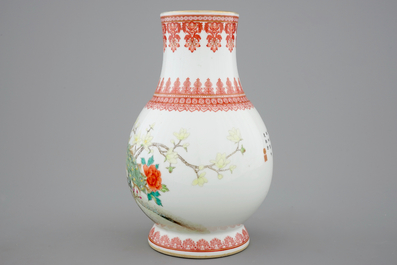 A Chinese Republic famille rose vase with a peacock, 20th C.