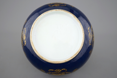 A large Chinese blue ground bowl with gilt decorations, 18th C.