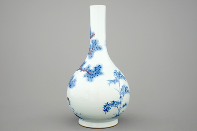 A Chinese blue and underglaze red bottle vase with cranes, 19/20th C.