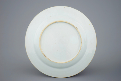 A Chinese famille rose plate with Europeans, Yongzheng (1723-1735)