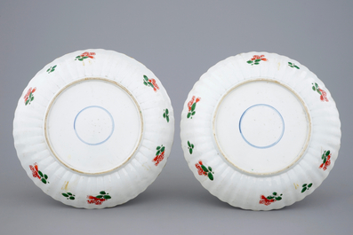 A pair of notched Chinese famille verte dishes with floral designs, Kangxi