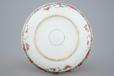 A fine Chinese famille verte dish with a flying fenghuang, Kangxi