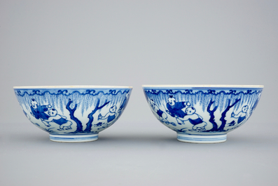 A pair of Chinese blue and white "Boys" bowls, Kangxi
