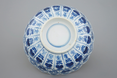 Three Chinese blue and white plates and a lotus shaped cup and saucer, Kangxi