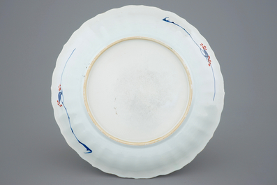 Un plat en porcelaine de Chine famille verte aux armes d'Artoys, Kangxi/Yongzheng, ca. 1720