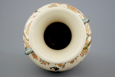 A tall figurative Japanese Satsuma vase, Meiji, 19th C.