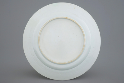 A large Dutch-decorated Chinese dish with a fisherman, 18th C.
