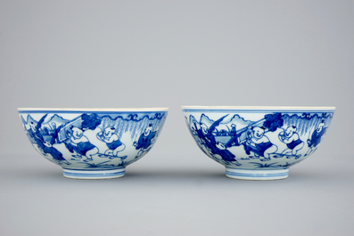 A pair of Chinese blue and white "Boys" bowls, Kangxi
