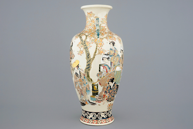 A tall figurative Japanese Satsuma vase, Meiji, 19th C.