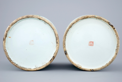 A pair of Chinese famille rose quail vases with covers, 19th C.