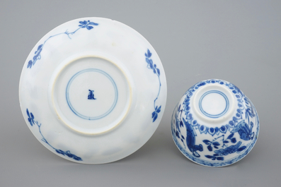 A collection of 9 Chinese blue and white cups and saucers, Kangxi