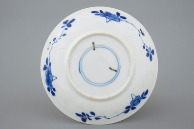 A collection of 9 Chinese blue and white cups and saucers, Kangxi