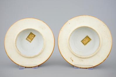 A tall pair of Chinese famille rose powder blue ground vases with covers, Qianlong, 18th C.
