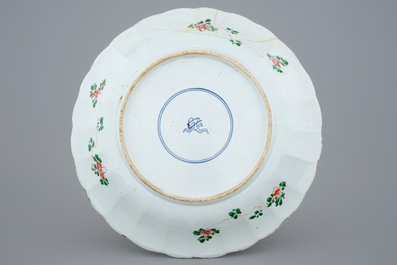 A large Chinese famille verte dish with a flower basket, Kangxi