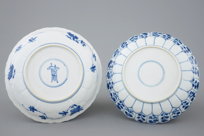 Three Chinese blue and white plates and a lotus shaped cup and saucer, Kangxi