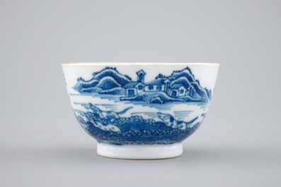 A Chinese blue and white cup and saucer with dogs, Qianlong, 18th C.