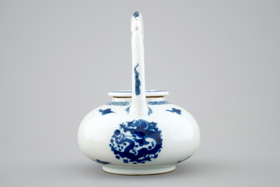 A Chinese blue and white high-handled dragons teapot, Kangxi