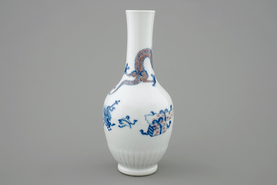 A Chinese blue and white and underglaze red vase with a dragon, Kangxi
