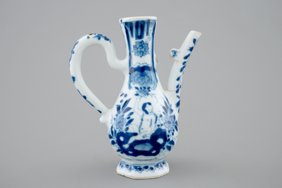 A small Chinese blue and white jug with a naked European, Kangxi