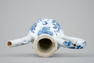 A small Chinese blue and white jug with a naked European, Kangxi