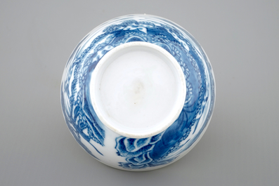 A Chinese blue and white cup and saucer with dogs, Qianlong, 18th C.