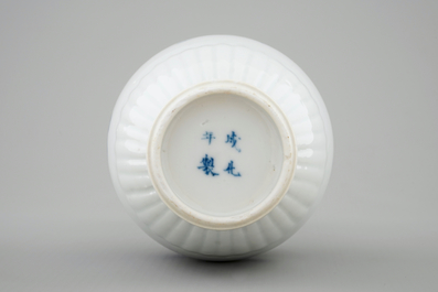 A Chinese blue and white and underglaze red vase with a dragon, Kangxi