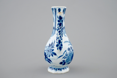 A small Chinese blue and white jug with a naked European, Kangxi