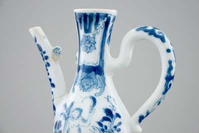 A small Chinese blue and white jug with a naked European, Kangxi
