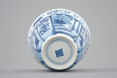 A rare Chinese blue and white Kangxi cup and saucer with French text, Kangxi