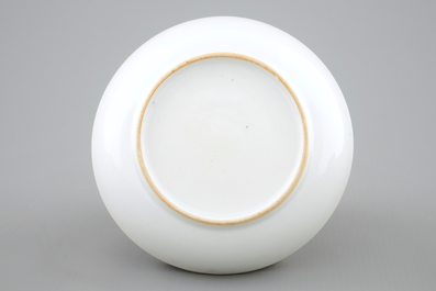 A Chinese blue and white cup and saucer with dogs, Qianlong, 18th C.
